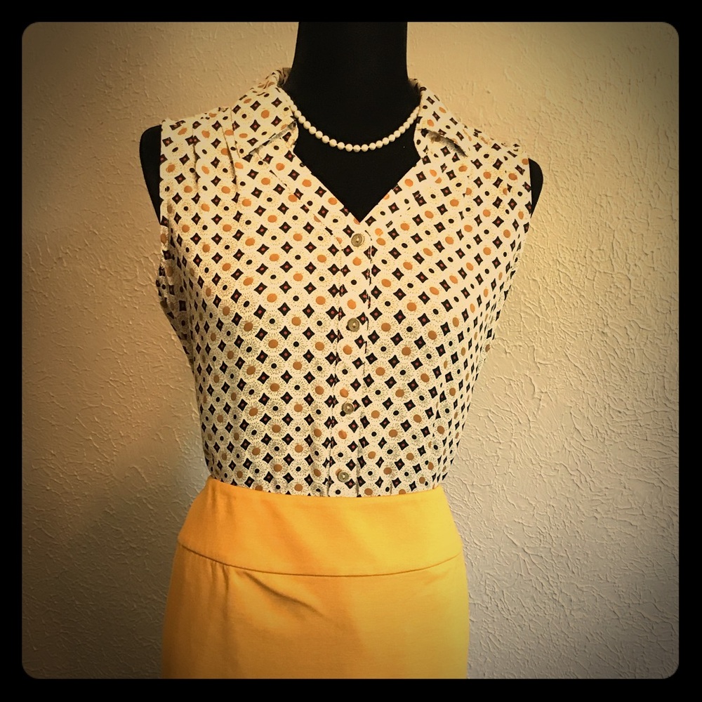 Small button up collared shirt.